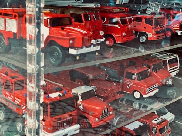 Fire engine models in window of antique shop in Berlin