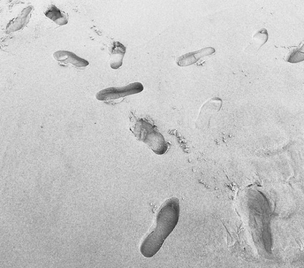 footsteps on beach 2026
